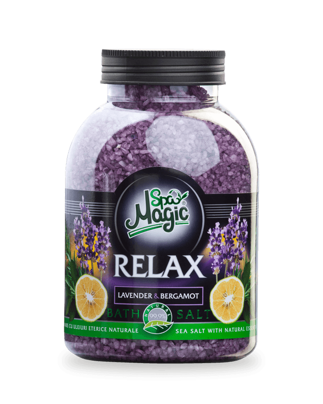 Sare de baie Magic SPA Relax, lavandă și bergamotă: recipient transparent de 1250 g cu cristale violete și capac negru